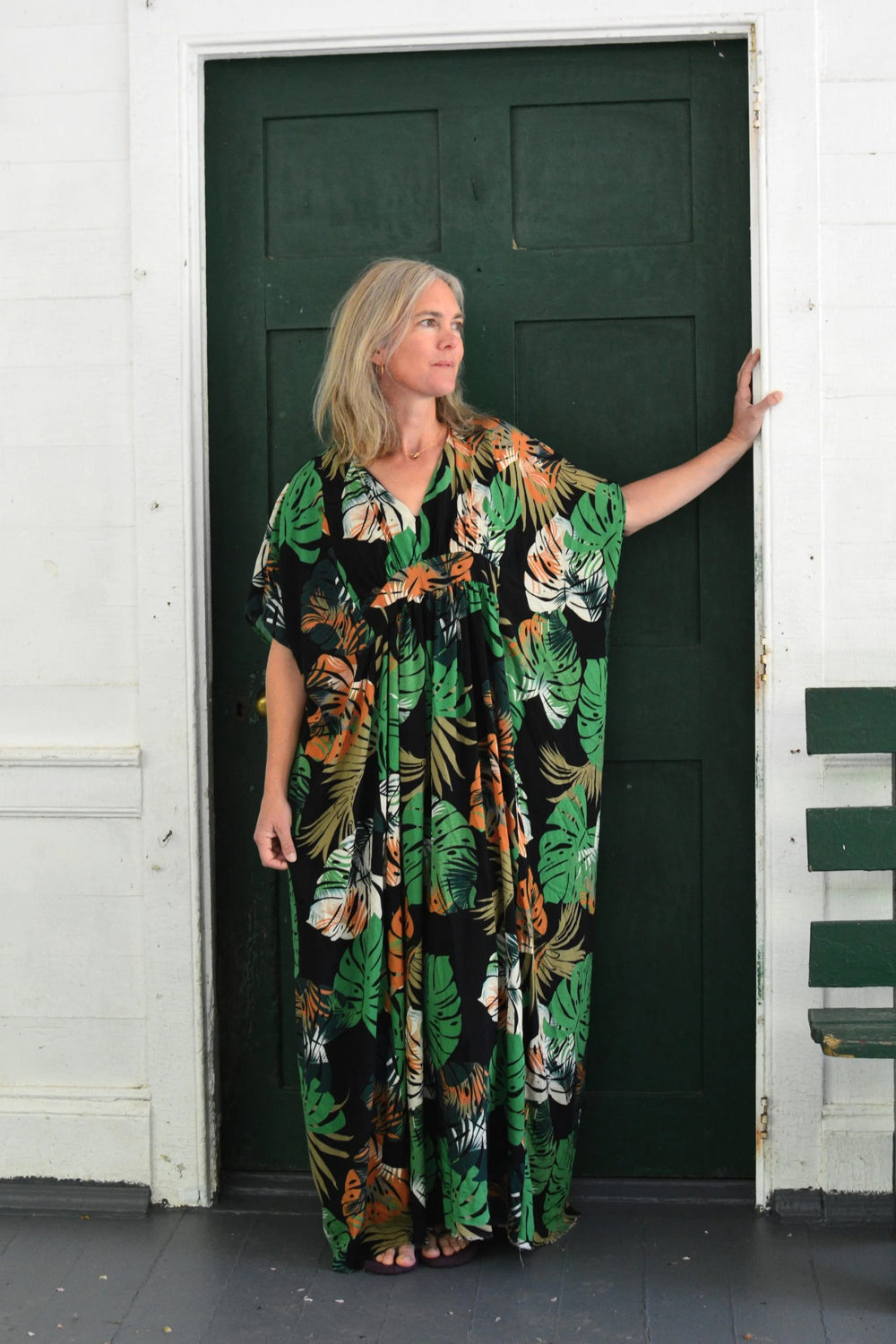 Woman wearing the 280 Resort Kaftan sewing pattern from Folkwear on The Fold Line. A pullover dress pattern made in silk, cotton gauze, voile, lawn, silk/cotton blends, handkerchief linen, rayon challis, or Tencel fabric, featuring 1970s styling with a V-