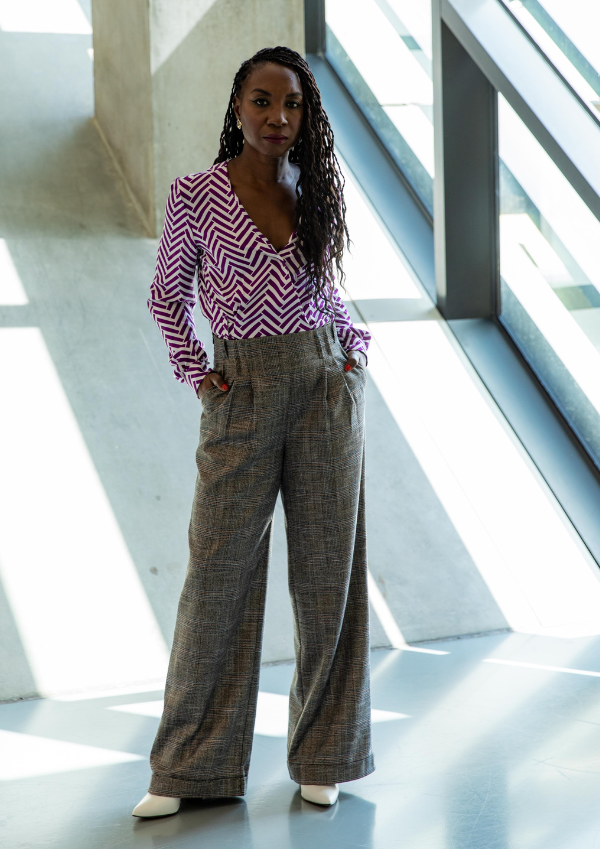 Woman wearing the Brooklyn Pants sewing pattern from Maison Fauve on The Fold Line. A trouser pattern made in viscose, tencel, light woollens, linen or jacquard fabrics, featuring a wide cut, high waist, front pleats, belt loops, invisible side zip, back