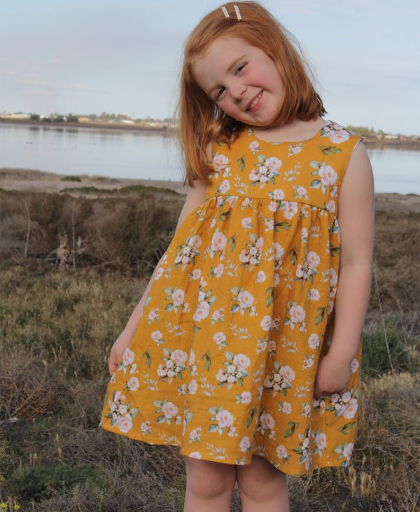 Below the Kōwhai Baby/Child Bellbird Dress