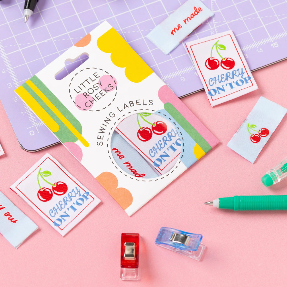 The 'Cherry on Top' woven labels from Little Rosy Cheeks on The Fold Line. The pack includes 6 labels ready to be sewn into your handmade clothes.