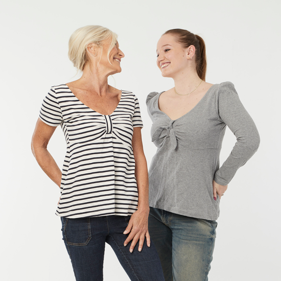 Women wearing the Envie T-shirt sewing pattern from Coralie Bijasson on The Fold Line. A T-shirt pattern made in knit fabric, featuring a low neckline, gathered bust with a fabric band or tie, and short or long plain or puff sleeves.