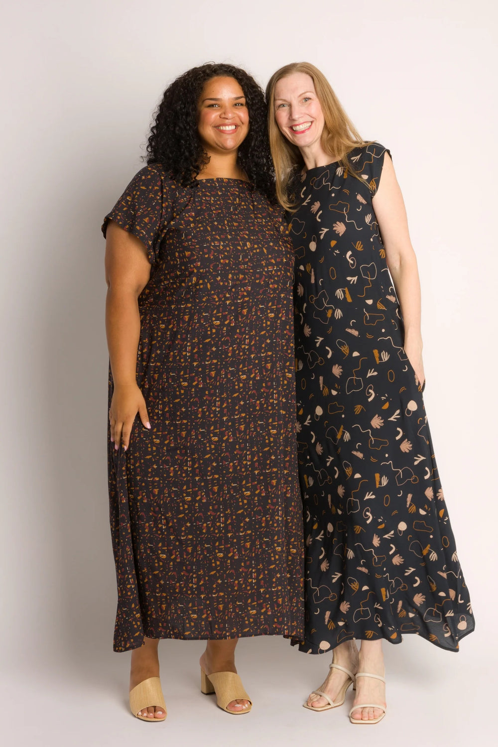 Women wearing the Garden Dress sewing pattern from Cris Wood Sews on The Fold Line. A dress pattern made in cotton, linen, gauze, viscose, cupro, rayon, cotton jacquard, or silk fabric, featuring a square neckline, grown-on short sleeves, A-line skirt, side seam pockets, and midi length.