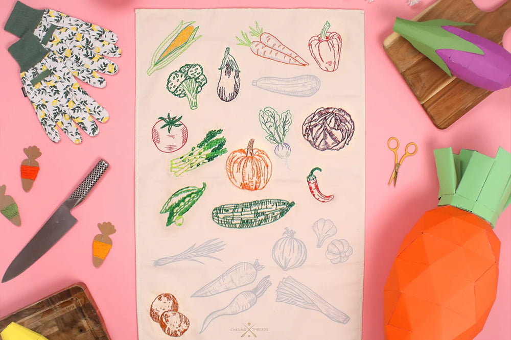 The Stitch Your Vegetables Tea Towel from Chasing Threads on The Fold Line. Simply stitch over the printed grey lines to create your own embroidered tea towel.