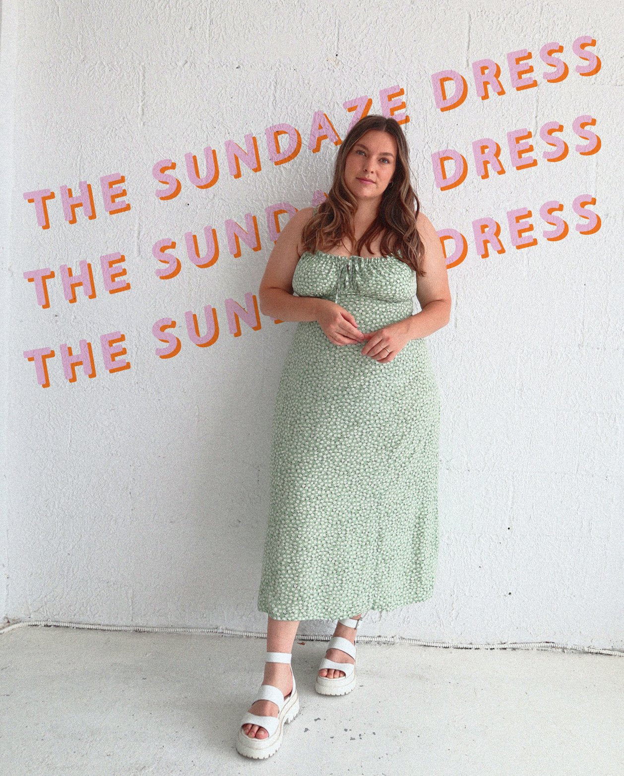 Woman wearing the Sundaze Dress sewing pattern from Les Perlines on The Fold Line. A dress pattern made in silk, satin, rayon, or viscose fabric, featuring thin straps, a gathered bust and keyhole detail, shirred back panel, and midi length.