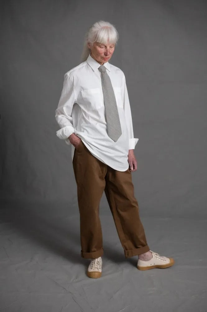 Woman wearing the Tie sewing pattern from Merchant & Mills on The Fold Line. A tie pattern made in linen, cotton lawn, cotton poplin, tencel, or Indian handloom fabric.