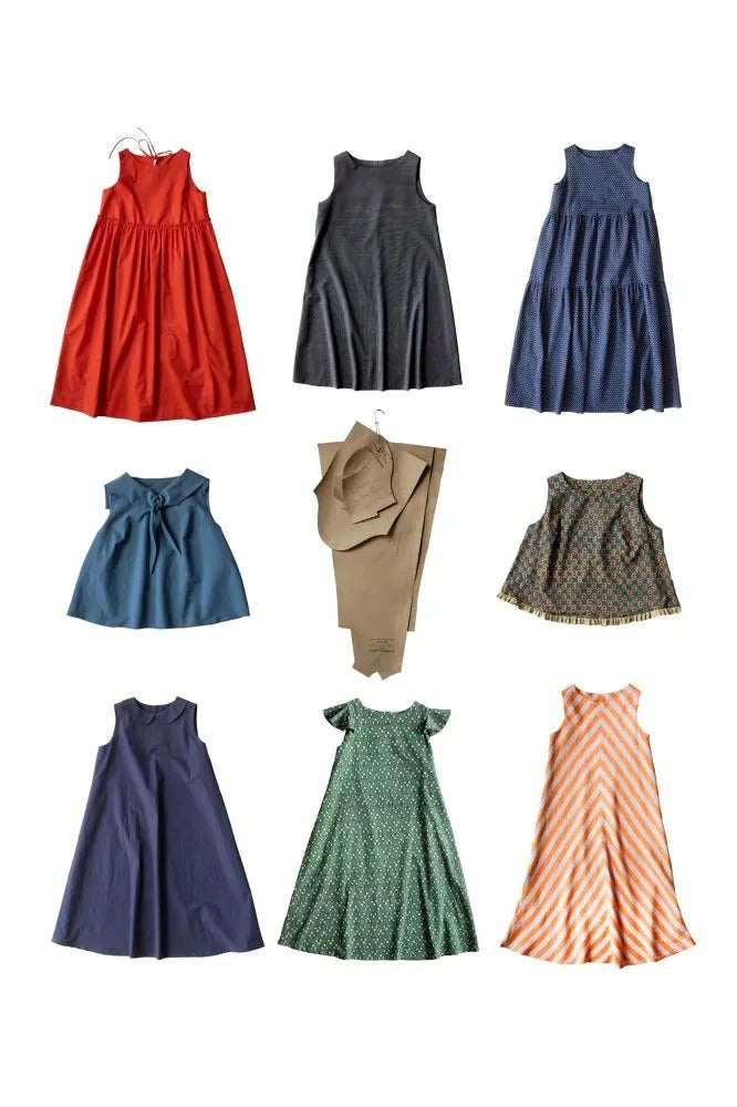 The Trapeze Pattern Additions sewing pattern bundle from Merchant & Mills on The Fold Line. This bundle includes instructions and pattern pieces for a peter pan collar, frill cap sleeve, frill hem top, sailor collar top, party dress, tiered dress, and bias cut dress.