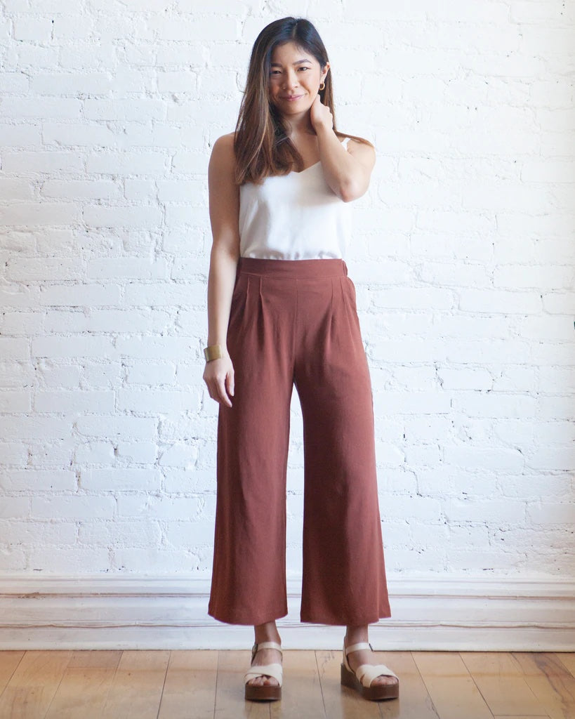 Woman wearing the Emerson Crop Pant sewing pattern from True Bias on The Fold Line. A trouser pattern made in linen, cotton, rayon challis, chambray or lightweight denim fabrics, featuring a pull-on style, cropped length, wide leg, elasticised back, flat