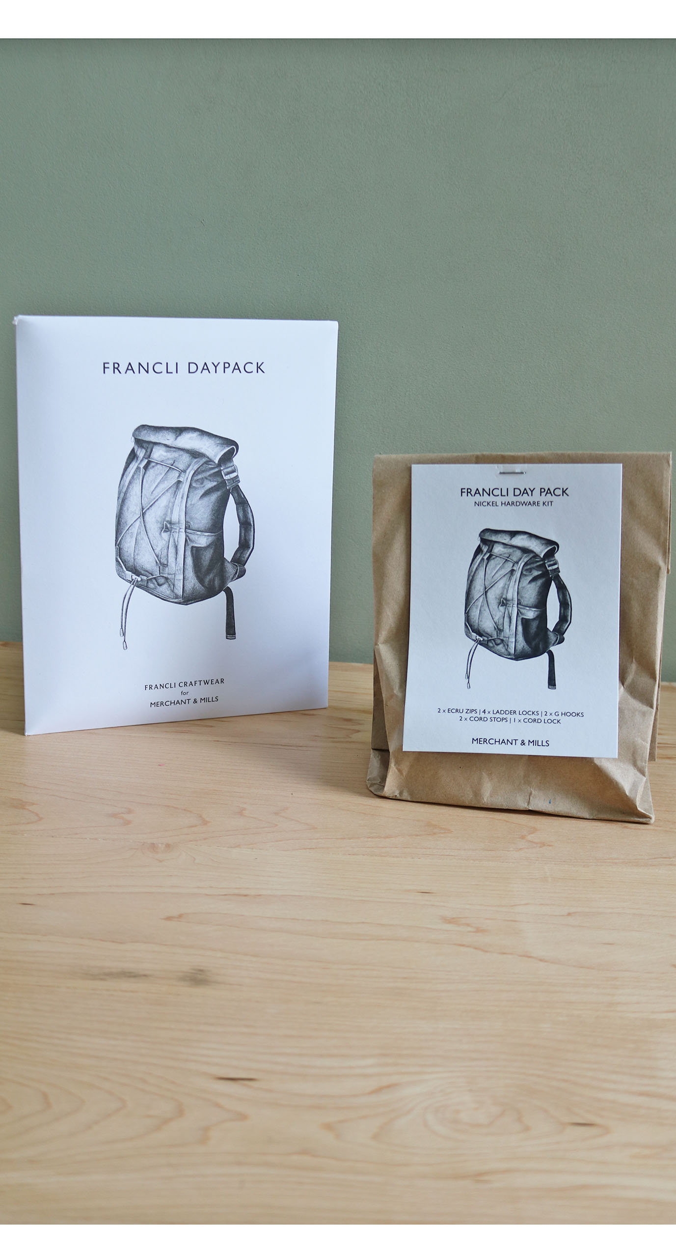 Photo showing the Merchant & Mills Francli Pattern and Hardware Kit Bundle. A fun and practical sewing project for any enthusiastic maker, and this bundle includes the sewing pattern plus all the hardware you need. A perfect gift or Christmas present.