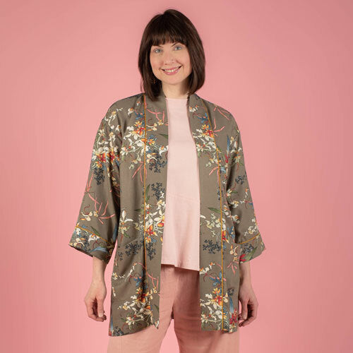 Women wearing the Ikina Two Jacket sewing pattern from The Sewing Workshop on The Fold Line. A jacket pattern made in linen, lightweight wool, silk, rayon, cotton, challis, novelty weave or knit fabrics, featuring a mid-length, loose-fit, narrow front ban