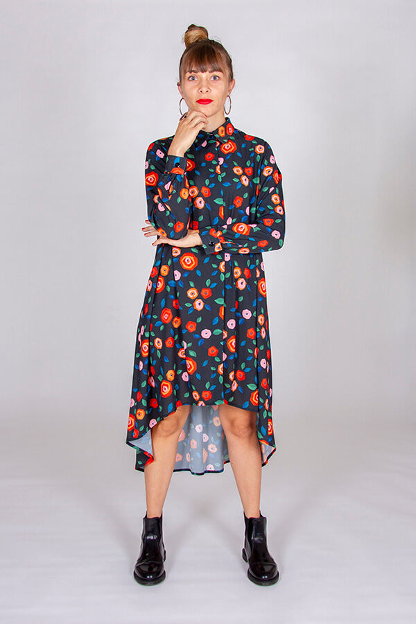 Woman wearing the Irma Dress sewing pattern from I AM Patterns on The Fold Line. A dress pattern made in poplin, viscose, lightweight denim, crepe, washed linen, chambray, wax, flannel, lightweight cotton twill, lightweight woollen fabric, or lightweight