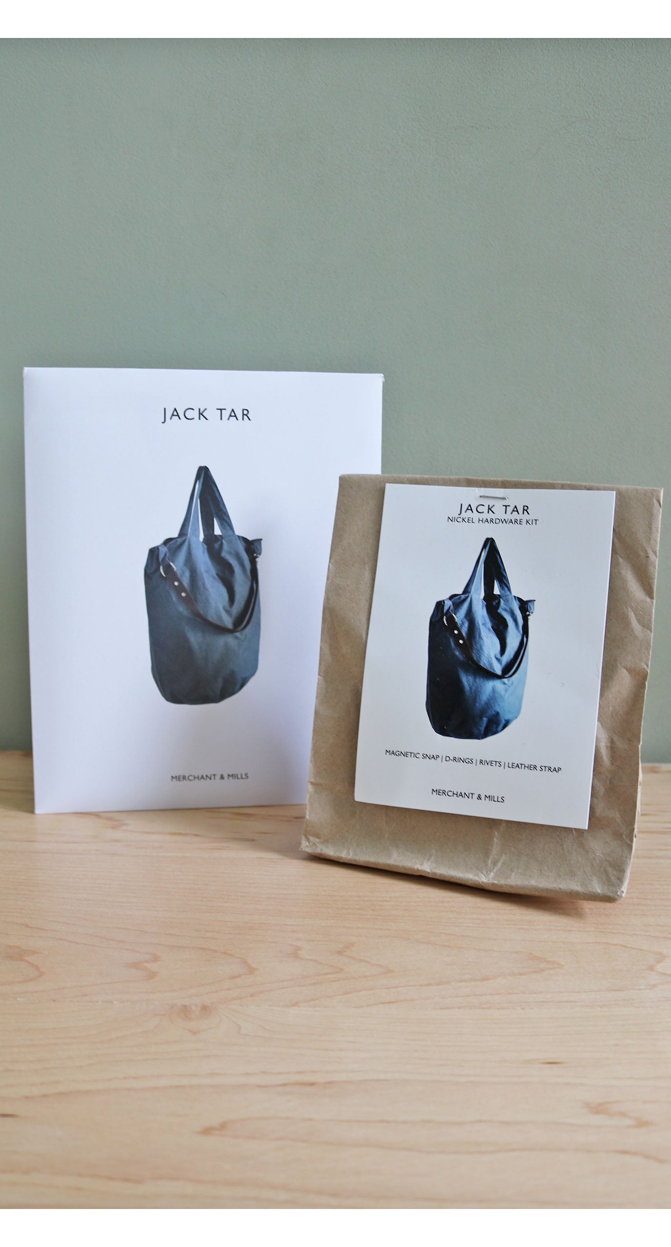 Photo showing the Merchant & Mills Jack Tar Pattern and Hardware Kit Bundle. A fun and practical sewing project for any enthusiastic maker, and this bundle includes the sewing pattern plus all the hardware you need. A perfect gift or Christmas present.