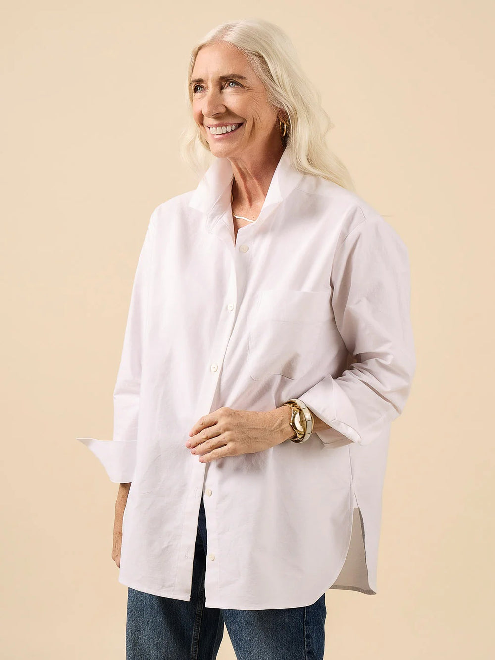 Woman wearing the Jenna Shirt sewing pattern from Closet Core Patterns on The Fold Line. A shirt pattern made in poplin, chambray, oxford, broadcloth, dobby, twill, linen, tencel, voile, viscose, silk, or flannel fabrics, featuring an oversized fit, drop