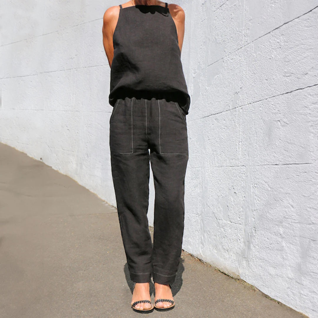 Woman wearing the Jensen Pants sewing pattern from Tessuti Fabrics on The Fold Line. A trouser pattern made in linen, lightweight wool, cotton, silk, and viscose fabrics, featuring a pull-on style, slim legs, deep front patch pockets with curved openings,