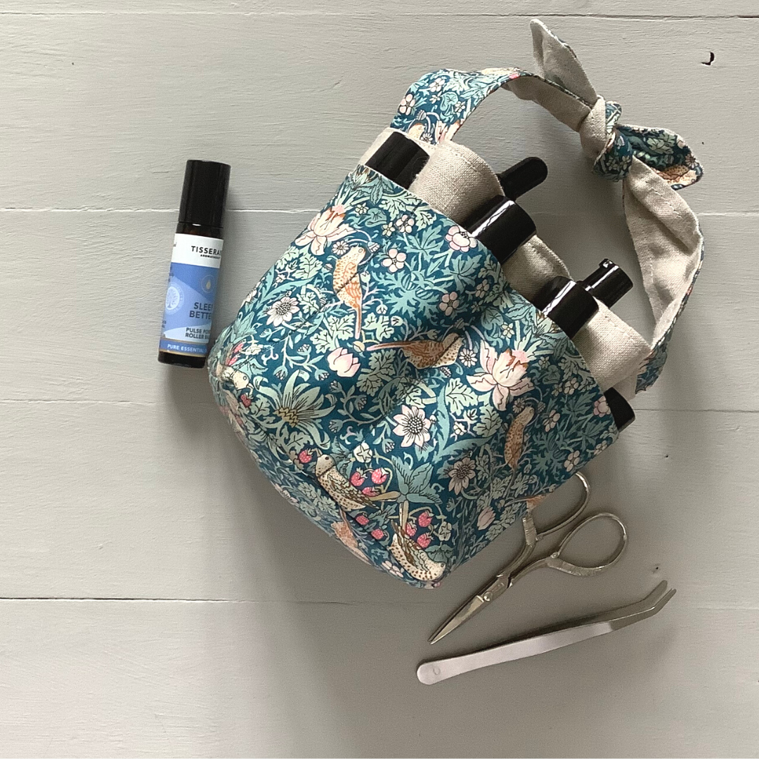 Photo showing the Lily Mini Tote Basket sewing pattern from Lasenby on The Fold Line. A tote basket pattern made in canvas, linen, Tana lawn, quilting cotton, twill, and thin tweed fabrics, featuring multiple outside pockets, centre pocket for mason jar,