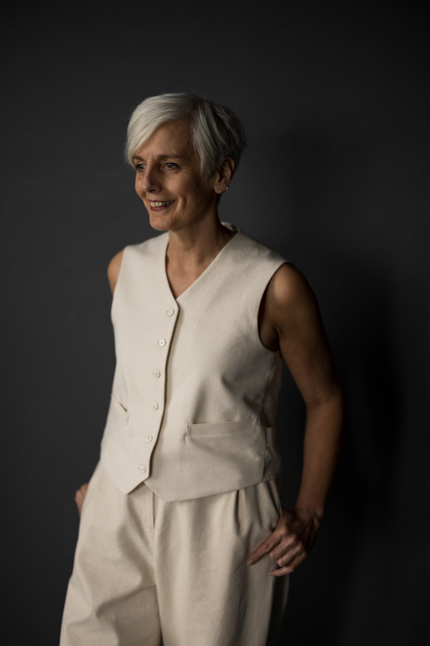 Women wearing the Miller Waistcoat sewing pattern from Merchant and Mills on The Fold Line. A waistcoat pattern made in denim, corduroy, wool, wool blends, cotton canvas or twill fabrics, featuring a boxy fit, front button closure, V-neck, two front welt