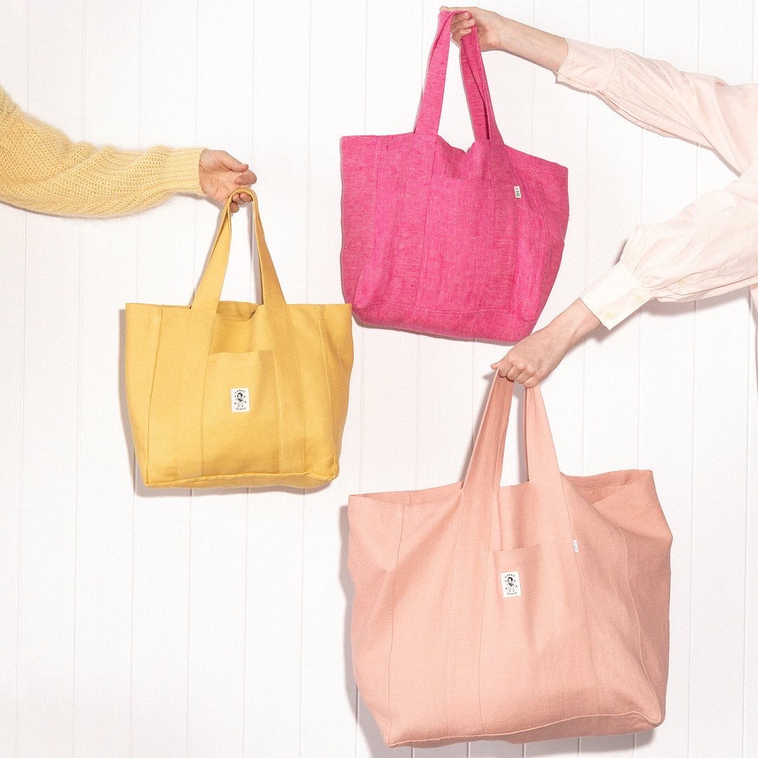 Photo showing the Mule Tote sewing pattern from Kylie & The Machine on The Fold Line. A tote bag pattern made in cotton twill, light canvas, chambray, quilting cotton, gingham, poplin, broadcloth, light corduroy, mid-weight linens, or nylons such as ripst