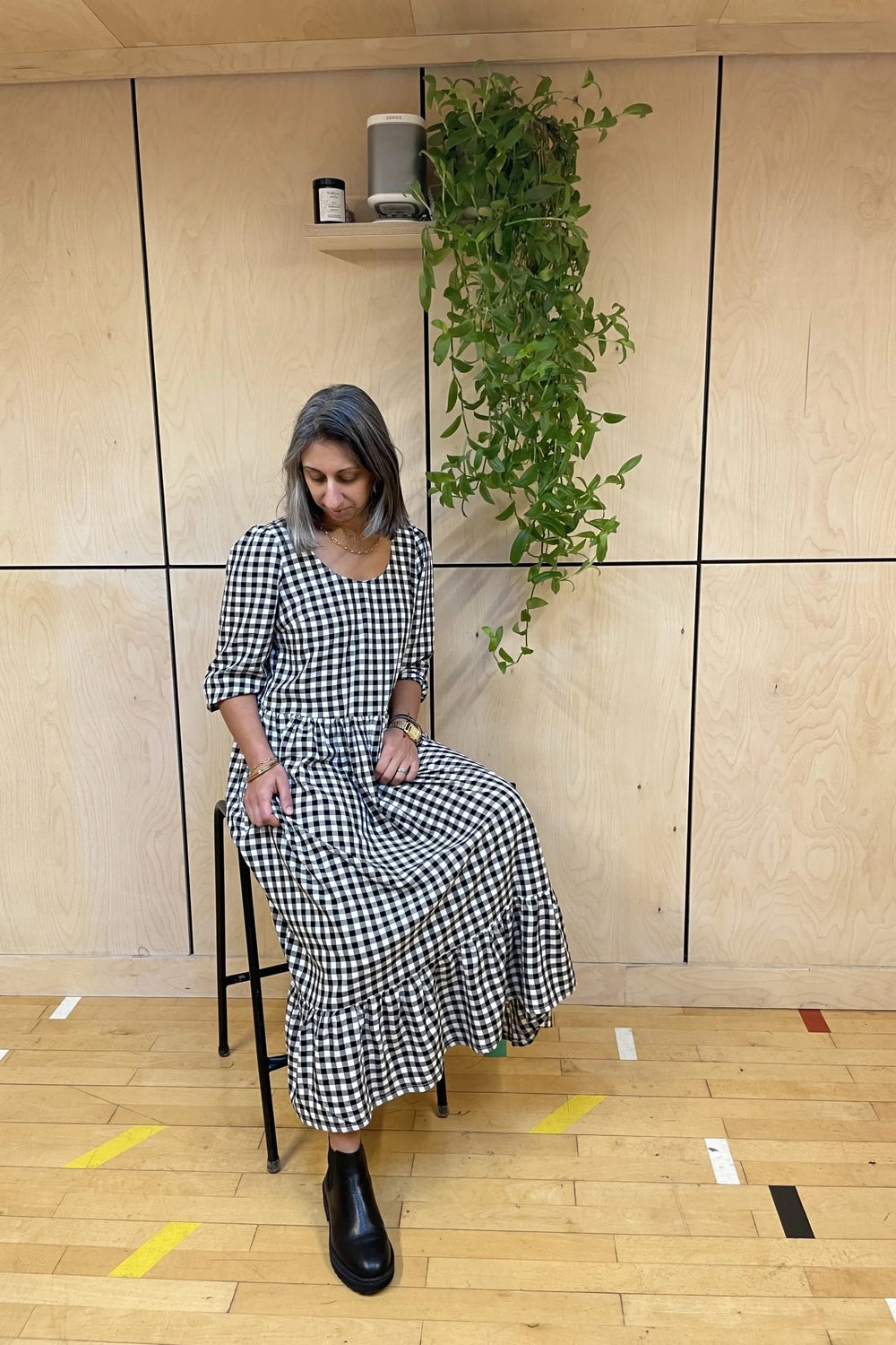 Woman wearing the Penny Dress sewing pattern from Make With Mandi on The Fold Line. A dress pattern made in viscose, viscose poplin, linen blends, brushed cottons, cotton poplins or poly blend fabrics, featuring a loose fitting bodice, skirt tier with gat