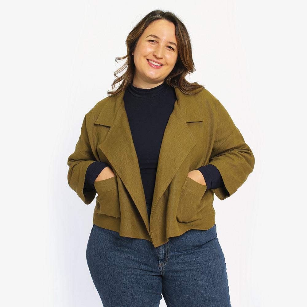 Woman wearing the Pona Jacket sewing pattern by Helens Closet. A blazer pattern made in linen, cotton, corduroy or wool fabric featuring an oversized blazer feel, complete with pockets and a statement lapel.