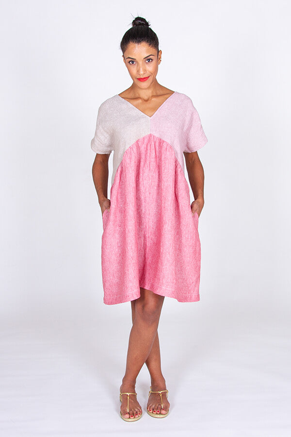 Woman wearing the Shérazade Dress sewing pattern by I AM Patterns. A dress pattern made in viscose, chambray, washed linen, batiste or silk fabrics, featuring a V-neckline on the front and back, short sleeves and in-seam pockets.