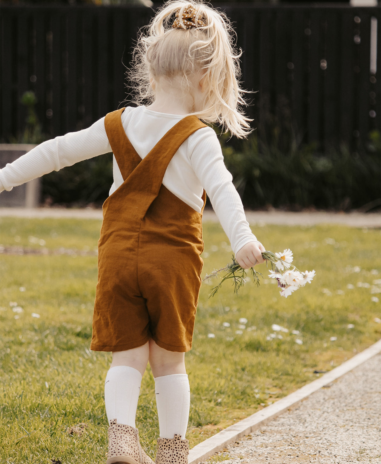 Below the Kōwhai Baby/Child Tipa Dungarees