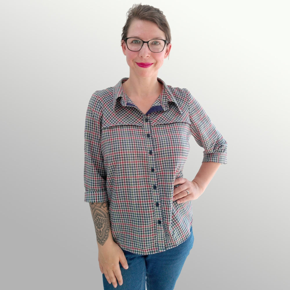 Woman wearing the Hailey Shirt sewing pattern from Experimental Space on The Fold Line. A shirt pattern made in viscose, linen or cotton lawn fabrics, featuring a relaxed fit, front and back yokes, ¾ length sleeve with turn back cuff, stand collar, button