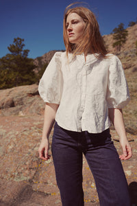 Women wearing the Anthea Blouse sewing pattern by Anna Allen. A blouse pattern made in cotton, linen, voiles, lawns or silk fabrics, featuring elbow length puffed sleeves, relaxed fit, button front closure with a fold-over placket and bias faced neckline.