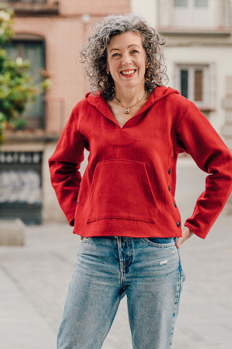 Woman wearing the Antwerp Pullover sewing pattern from Liesl + Co on The Fold Line. A pullover pattern made in wool flannel, lightweight wool coating, denim, corduroy, ponte or French terry fabrics, featuring a boxy shape, slightly cropped, front kangaroo