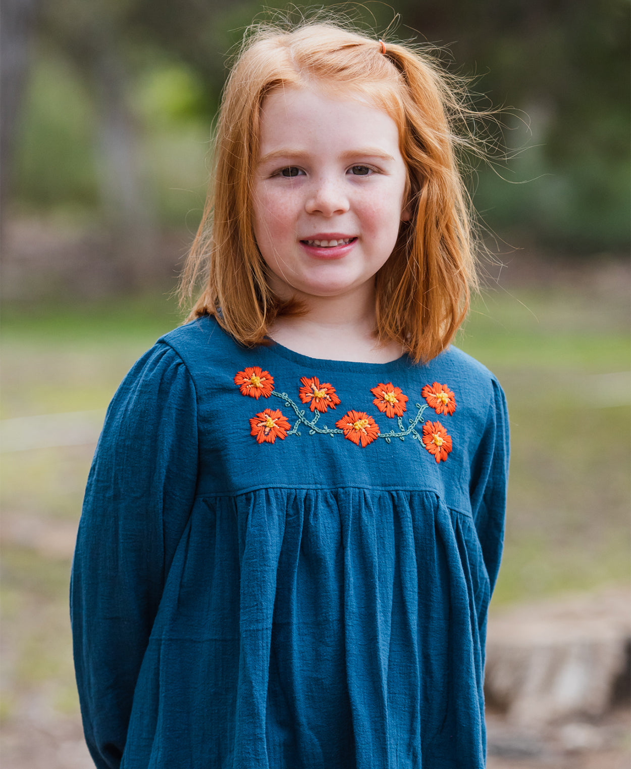 Below the Kōwhai Baby/Child Bellbird Dress