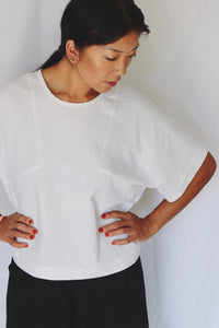 Women wearing the Block Tee sewing pattern from Paper Theory Patterns on The Fold Line. A T-shirt pattern made in linen, cotton, crepe de chine or silk fabrics, featuring a boxy silhouette, oversized fit, elbow length sleeves and round neck.