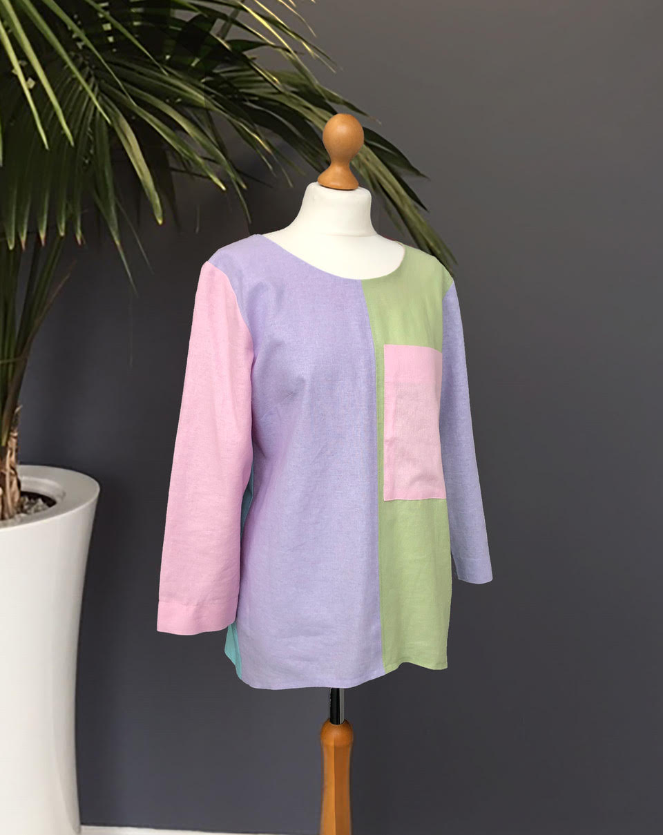 Woman wearing the Block Top sewing pattern from Sew Different on The Fold Line. A top pattern made in linen, cotton, viscose, rayon, silk, chambray, ponte de roma, stretch velvet, needlecord or lightweight wool fabrics, featuring an oversized shirt that p