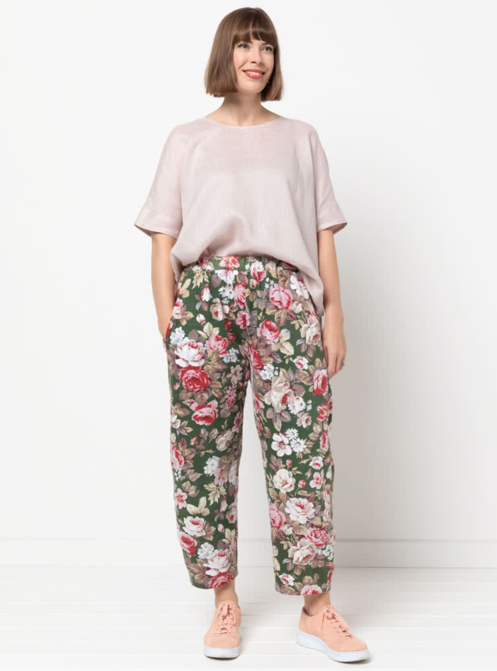 Woman wearing the Bob Woven Pant sewing pattern from Style Arc on The Fold Line. A trouser pattern made in washed linen, light wool, rayon or crepe fabrics, featuring a balloon shape, relaxed fit, elastic waistband, slightly cropped length, and in-seam po