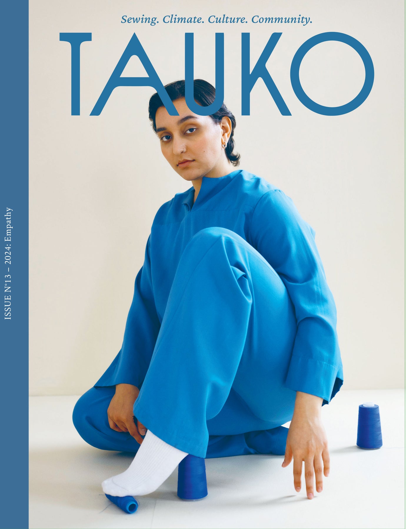 Issue No. 13 of TAUKO Magazine on The Fold Line. Focusing on the theme of empathy, it includes nine winter-ready sewing patterns.