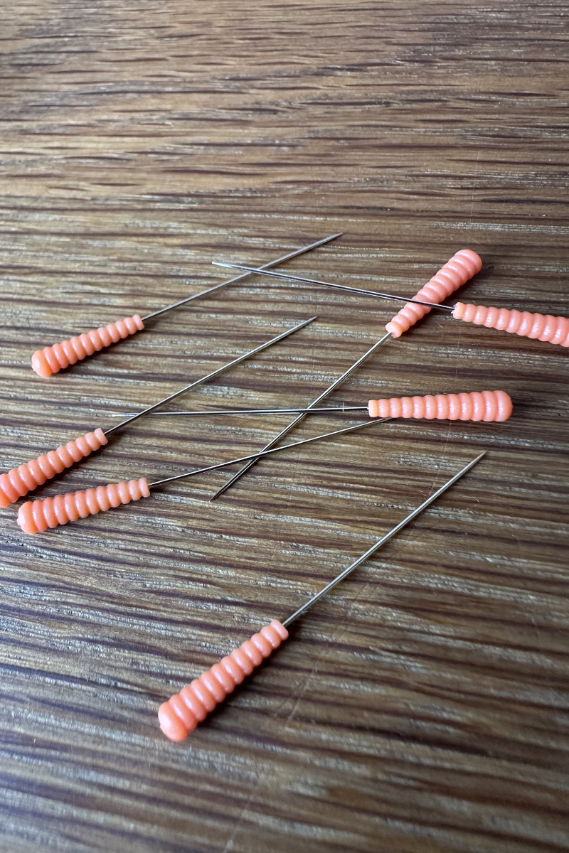 Magic Pins: Extra-Fine Silk (0.4 mm) from Taylor Seville on The Fold Line. 50 pins featuring a patented comfort grip silicone head and a super sharp point.