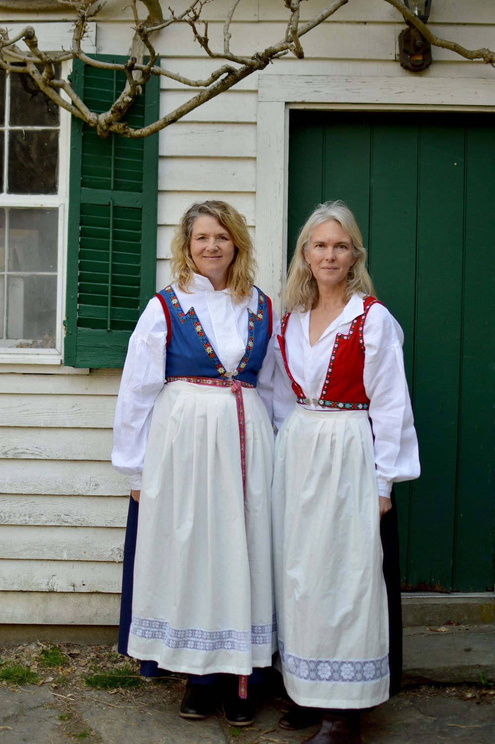 Women wearing the 147 Norwegian Bunad sewing pattern from Folkwear on The Fold Line. A bunad pattern made in linen, cotton, rayon, silk, or wool fabric, featuring a blouse, vest, skirt, and apron.