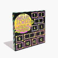 The 2025 Sweary Sewist Advent Calendar from Kylie & The Machine on The Fold Line. The calendar features 30 premium polyester woven labels in 12 windows.