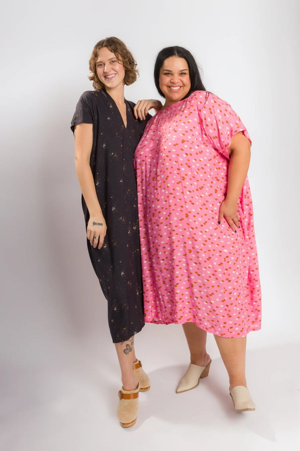 Women wearing the Best Bundle sewing pattern bundle from Cris Wood Sews on The Fold Line. A collection of low-waste dress patterns, including the Casita Dress and Envelope Dress, made in lightweight woven fabrics with drape.