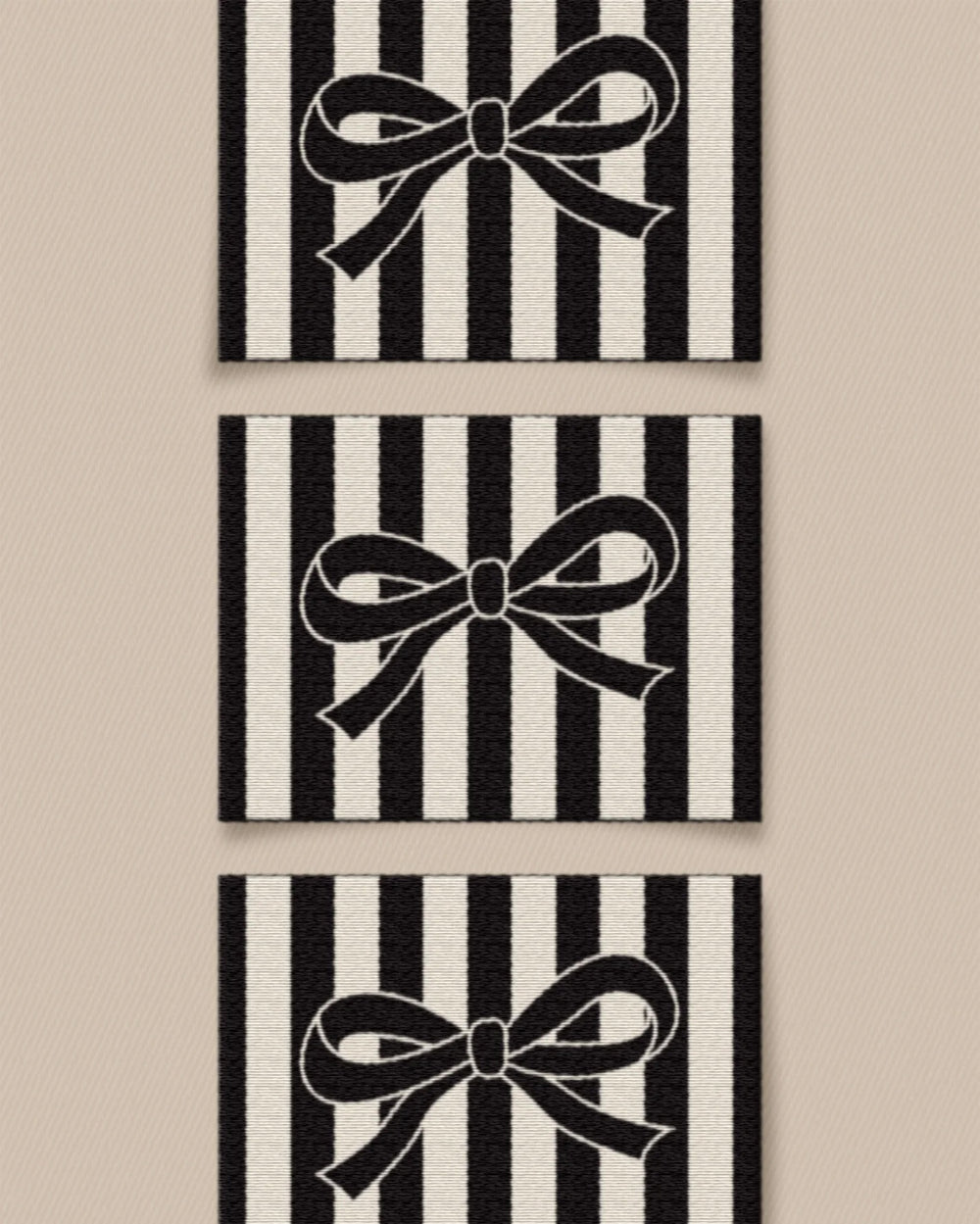 'Black Bow Large' woven labels from Matchy Matchy Sewing Club on The Fold Line. The pack includes 6 woven labels to sew onto your handmade clothes and accessories.