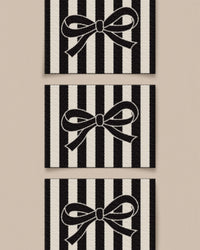 'Black Bow Large' woven labels from Matchy Matchy Sewing Club on The Fold Line. The pack includes 6 woven labels to sew onto your handmade clothes and accessories.