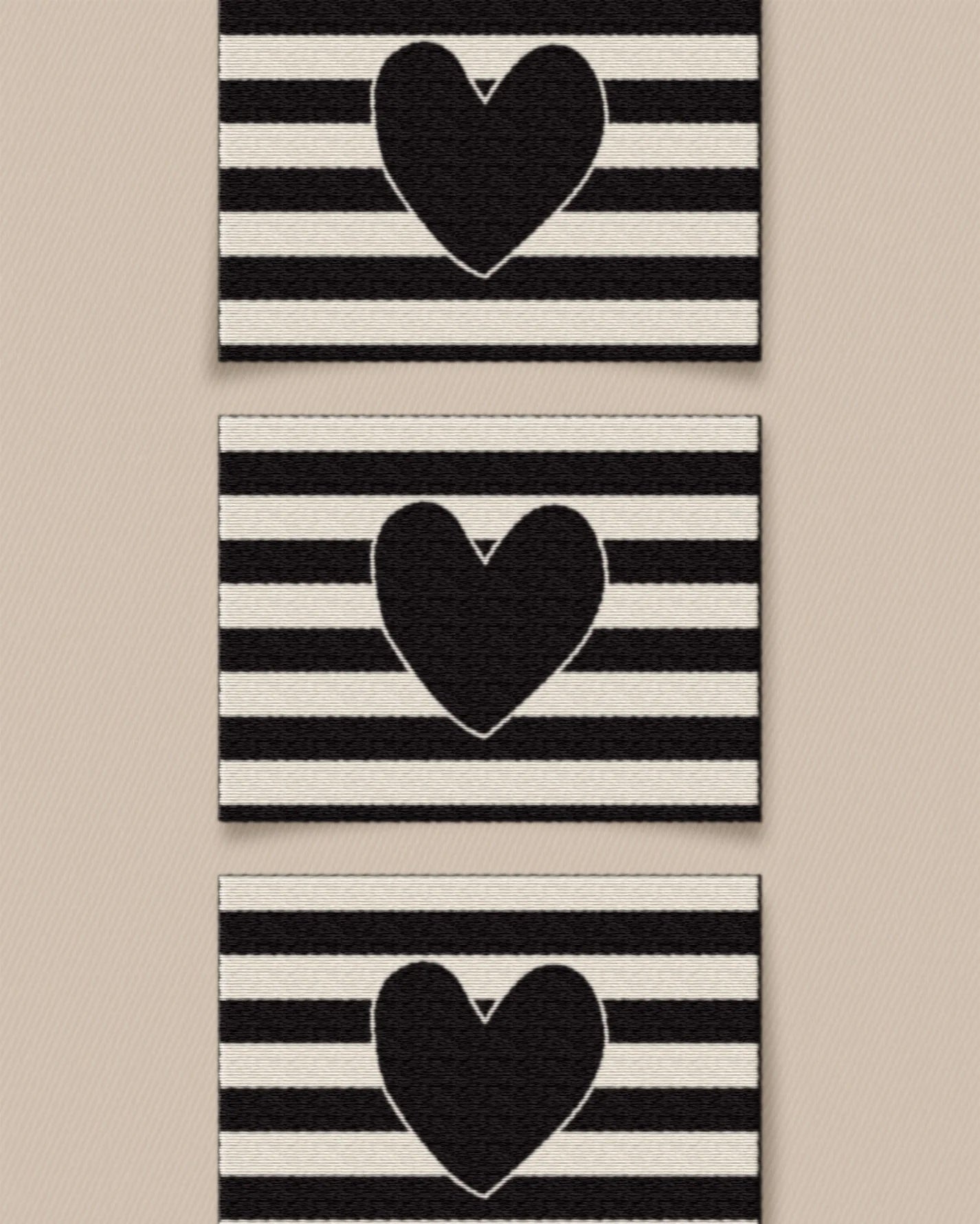 'Black Heart Large' woven labels from Matchy Matchy Sewing Club on The Fold Line. The pack includes 6 woven labels to sew onto your handmade clothes and accessories.