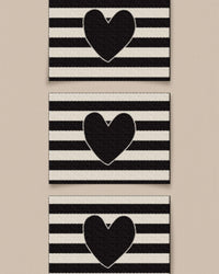 'Black Heart Large' woven labels from Matchy Matchy Sewing Club on The Fold Line. The pack includes 6 woven labels to sew onto your handmade clothes and accessories.