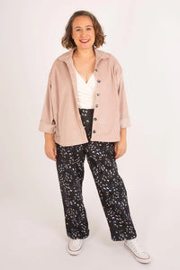 Woman wearing the Farley Shacket sewing pattern from Sew Over It on The Fold Line. A jacket pattern made in canvas, denim, corduroy, chambray, stretch cotton, or viscose twill fabric, featuring a slightly oversized fit, button front, classic collar with collar stand, panelled body, and double-entry pockets.