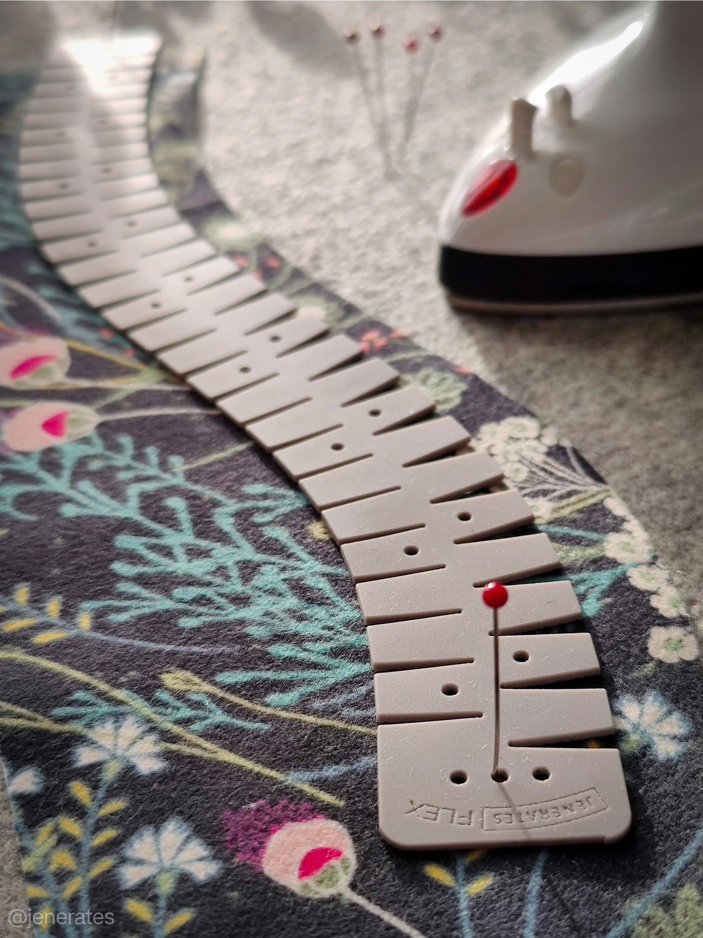 The Flex Hemmer from Jenerates on The Fold Line. This silicone hemmer can curve in either direction or even both at the same time, perfect for shirttails. 