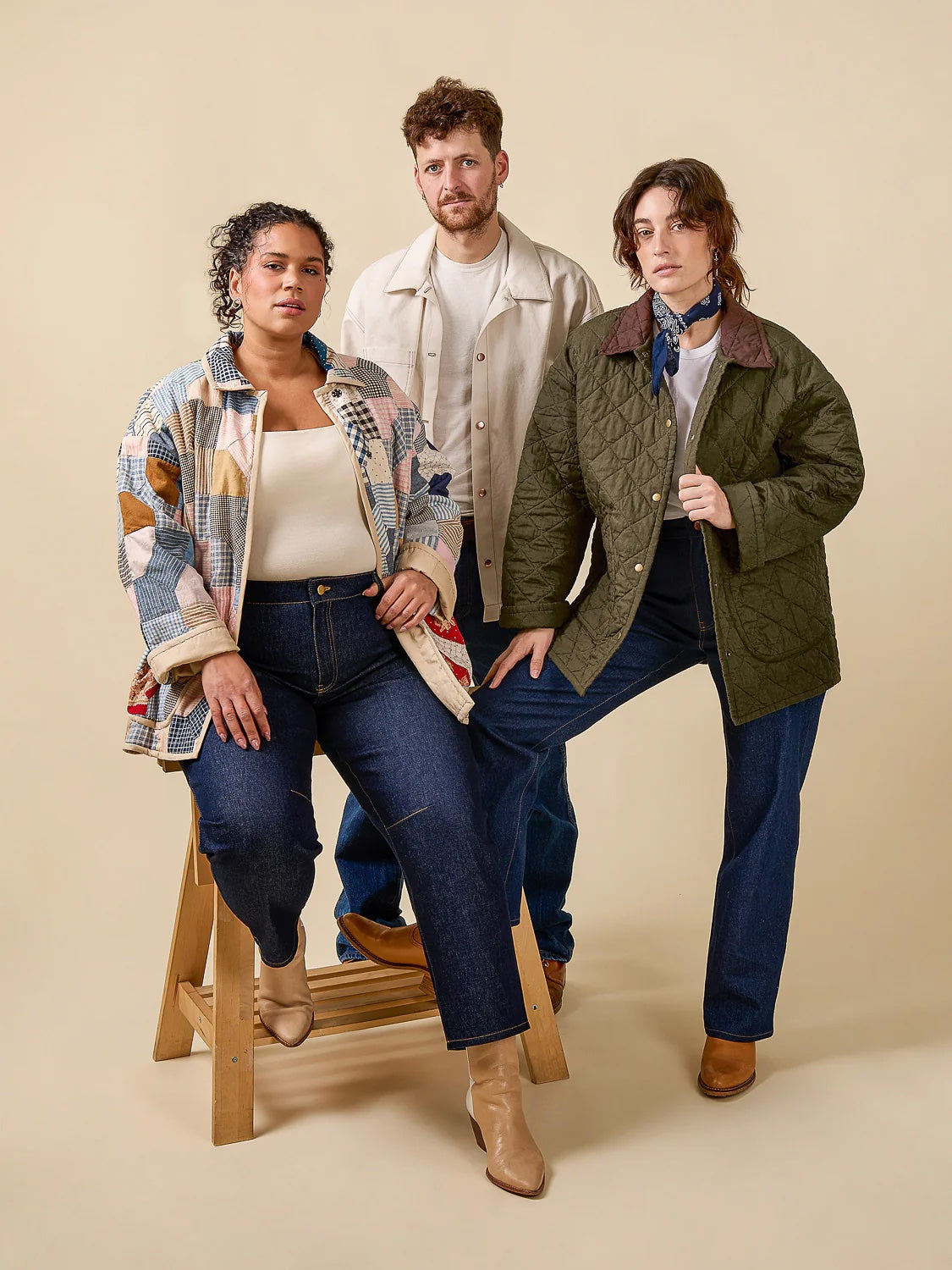 Women and man wearing the Fowler Barn Coat and Quilted Jacket sewing pattern from Closet Core Patterns on The Fold Line. A workwear-inspired jacket pattern made in canvas, twill, denim, corduroy, wool, jacquard, brocade, cotton, linen, or pre-quilted fabric, featuring a boxy shape, dropped shoulder, bandless collar, two-piece sleeve, pockets, and buttons or snaps.