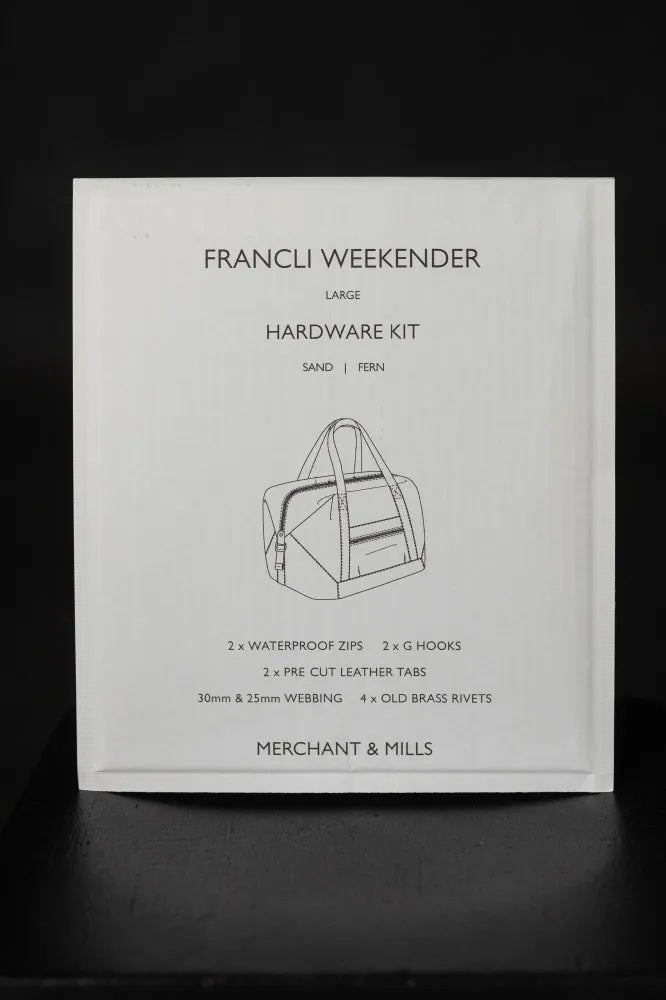 The Francli Weekender Bag Hardware Kit (Fern) from Merchant & Mills on The Fold Line. The kit includes rivets, G hooks, leather tabs, webbing, and water repellent zips.
