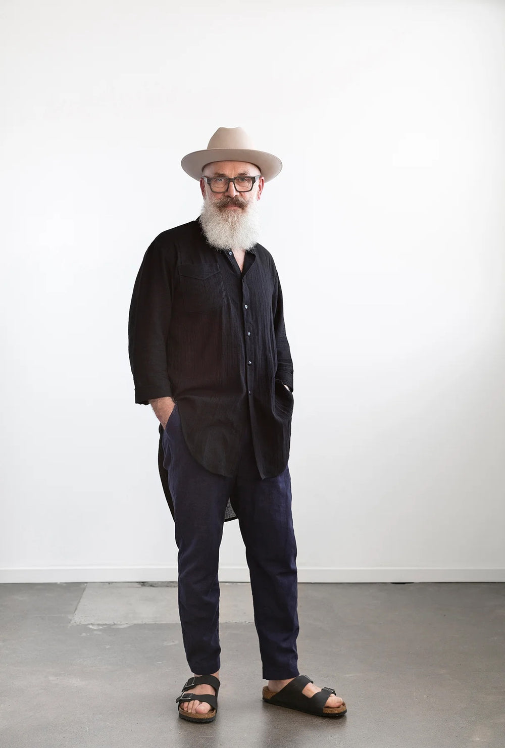 Man wearing the Fremantle Pants sewing pattern from Elbe Textiles on The Fold Line. A trousers pattern made in linen, linen blend, tencel, cotton, or hemp fabric, featuring a relaxed fit, mid rise, elasticated waistband with a drawstring, side and back pockets, and slightly tapered leg.