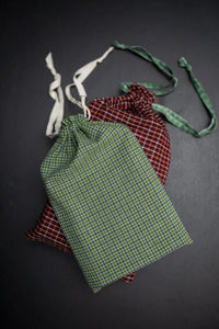 The Gift Bag sewing pattern from Merchant & Mills on The Fold Line. A bag pattern made in fabric offcuts, featuring a drawstring top.