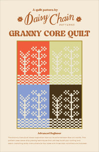 The Granny Core Quilt sewing pattern from Daisy Chain Patterns on The Fold Line. A quilt pattern made in quilting cotton fabric, featuring heirloom fibre art motifs made using strip piecing.