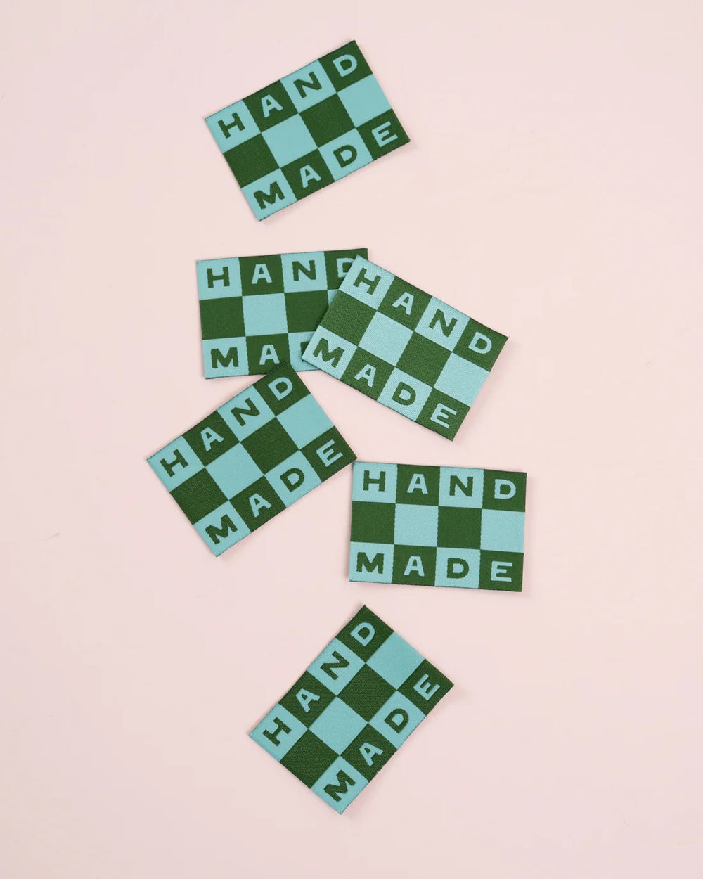 'Handmade Checkerboard Large' woven labels from Matchy Matchy Sewing Club on The Fold Line. The pack includes 6 woven labels to sew onto your handmade clothes and accessories.