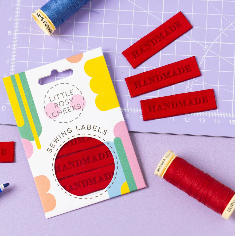 'Handmade Velvet (Red)' woven labels from Little Rosy Cheeks on The Fold Line. The pack includes 4 red velvet labels ready to be sewn into your handmade clothes.