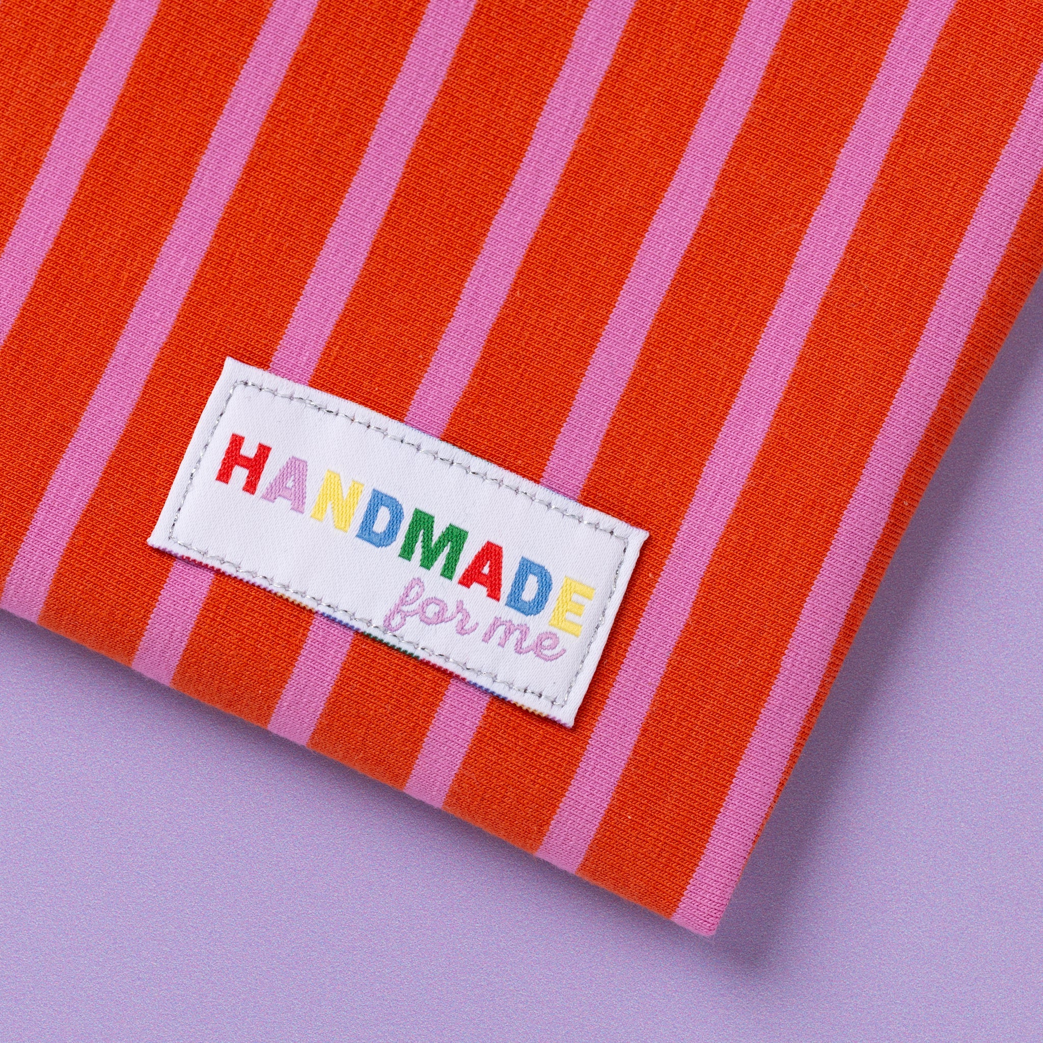 The 'Handmade for Me' woven labels from Little Rosy Cheeks on The Fold Line. The pack includes 6 labels with rainbow text on a white background, ready to be sewn into your handmade clothes.